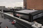 Motorized glass roofs for restaurants