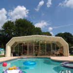 Residential retractable pool enclosure
