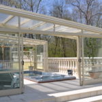 Retractable residential pool and patio enclosure