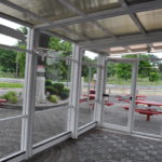 Retractable restaurant patio enclosure