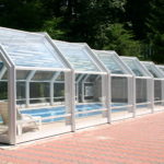 Retractable residential pool enclosure
