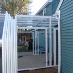 Residential glass pool enclosure entrance