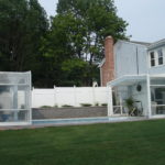 Retractable pool enclosure