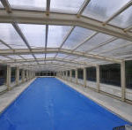 Retractable pool enclosures