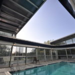 Retractable glass pool room