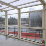 home plate retractable glass room
