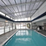 Retractable glass pool room