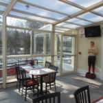 home plate retractable glass room