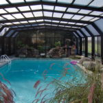 Retractable pool enclosures for homes