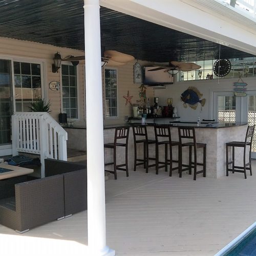 Moving Glass Wall System Manufactured by RollACoverAmerica's Leading