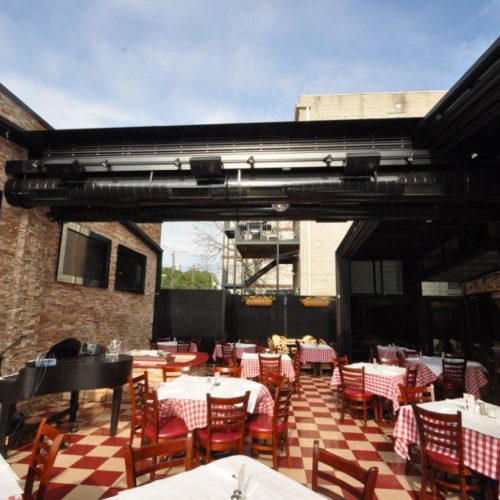 Jack's Wicker Park Retractable Enclosure by RollACoverAmerica's