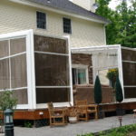 Retractable glass enclosure