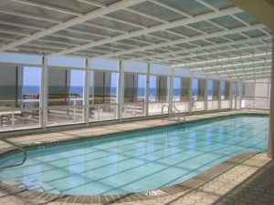rooftop retractable pool enclosure