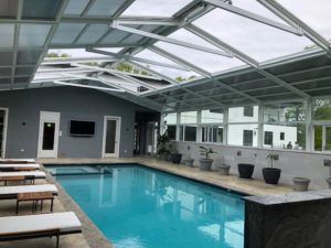 residential retractable glass roofing system