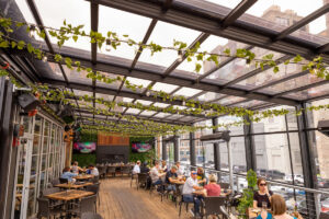 How Milwaukee’s Café Benelux Rooftop Became a Year-Round Destination cafe benelux milwaukee retractable roof
