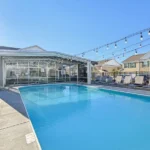 latham apartments retractable pool enclosure